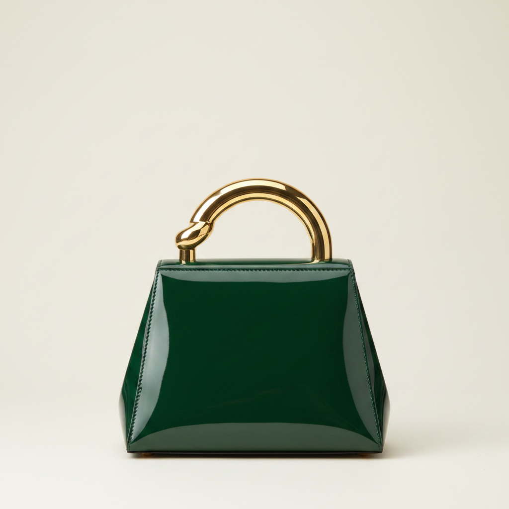 Forest green patent leather trapezoid handbag with gold swirl handle